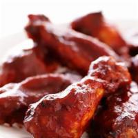 Mango Habanero Wings · 6 Wings dipped in Mango Habanero Sauce, with Celery stick and Carrot.