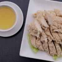 Lemon Chicken · Sliced white meat chicken deep fried with fresh lemon sauce with rice.