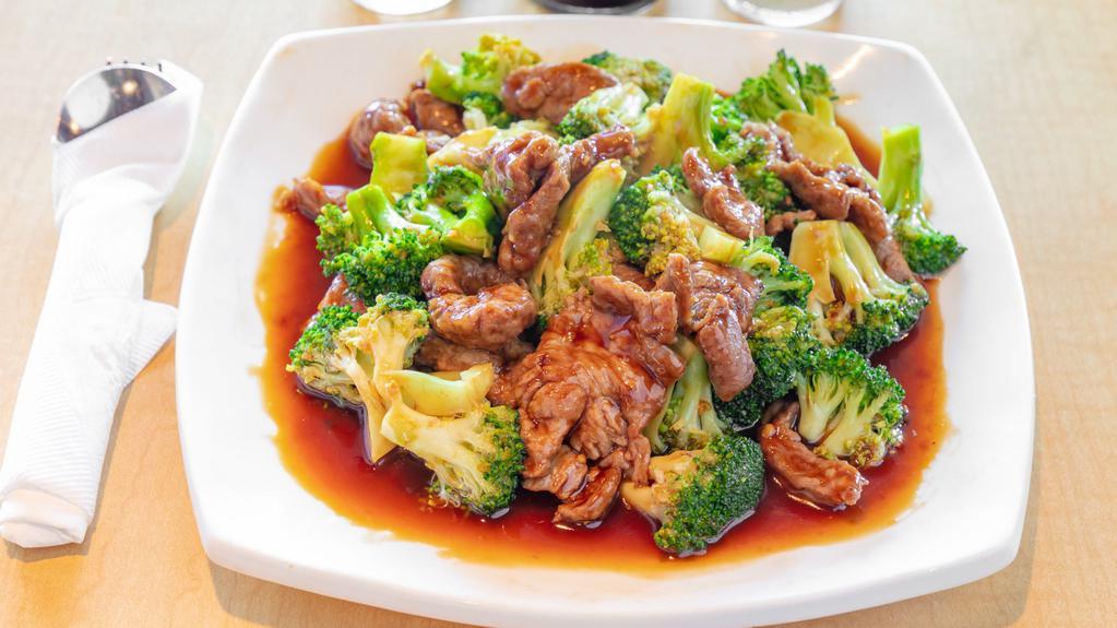 Beef With Broccoli · With white rice.