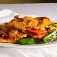Happy Family · A delightful combination of shrimp, beef & chicken tender in a brown sauce w. assorted veget...