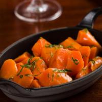 Moroccan Spiced Glazed Carrots · Dried Currants, Parsley
