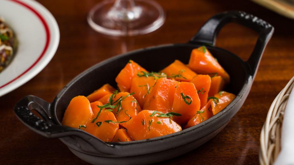 Moroccan Spiced Glazed Carrots · Dried Currants, Parsley