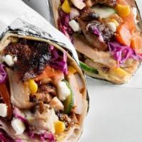 Dürüm Wrap · ****Served in a tortilla wrap****: This great-to-share wrap is offered with your choice of s...