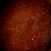 Side Red Sauce · Mildly spicy harissa-based chili sauce.