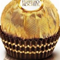 Ferrero Rocher (Hazelnut Chocolate) · A tempting combination of smooth chocolatey cream surrounding a whole hazelnut within a deli...