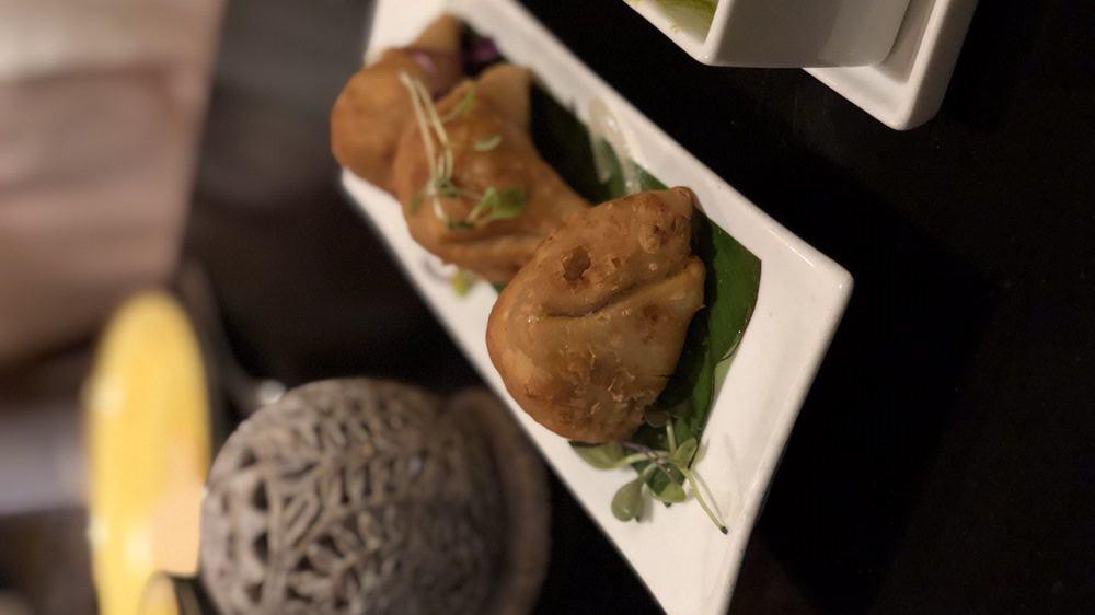 Samosa · Triangular pastry with spiced peas and potatoes...Vegan & Hot