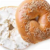 Sesame Bagel With Cream Cheese · Fresh homemade sesame bagel smothered with cream cheese.