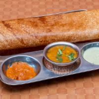 Masala Dosa · Crepe stuffed with mildly spiced potato and peas.