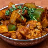 Aloo Gobi · Vegan, gluten free. Potato, cauliflower, onion, pepper and tomato stir-fried with homemade m...
