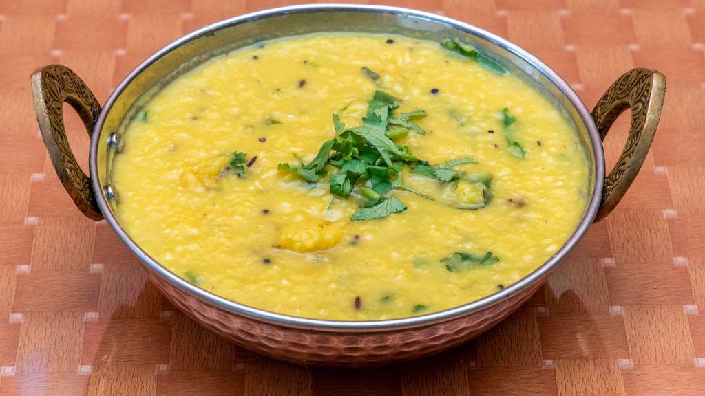 Yellow Lentil Tadka · Vegan, gluten free. Cooked lentil tempered with whole spices.