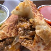 Chopped Cheese Burrito · Flour tortilla, spiced ground beef, caramelized onions and cantina cheese sauce. Has gluten....