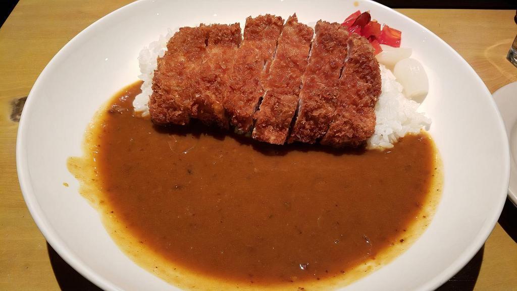 Katsu Curry · Pork cutlet & curry over rice.