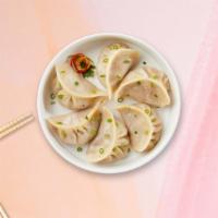 Homemade Vegan Dumplings · (6 pieces) Dumplings with protein and veggies.