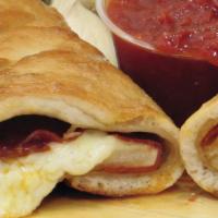 Pepperoni Stromboli · Traditional hand-rolled fresh dough stuffed with hearty pepperoni, 100% whole milk mozzarell...