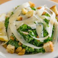 Kale Salad · Fresh kale, golden raisins, shallots, parmesan cheese, house-made lemon dressing, croutons.