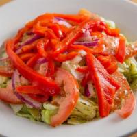 Whitmans House Salad · Iceberg lettuce, roasted red peppers, red onion, tomato, house-made vinaigrette.