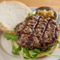 Highline Hanger Burger · Hanger steak blend patty, caramelized onions, arugula on a toasted sesame bun.