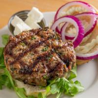 Lamb Burger · Spicy. Lamb blend patty, goat or feta cheese, red onion, arugula, mayonnaise on a toasted se...