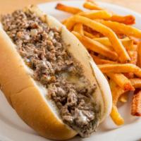 East Villi Cheesesteak · Chip steak, sautéed onions, melted American cheese, on toasted hoagie roll, served with fries.