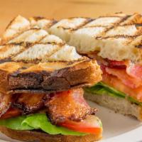 Blt · Applewood smoked bacon, lettuce, tomato, special sauce, on blue ribbon pullman bread.