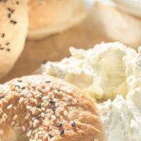 Bagel With Plain Cream Cheese · Boiled and baked round bread roll.