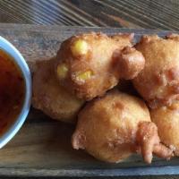 Corn Fritters (8 Piece) · with honey-chile dipping sauce