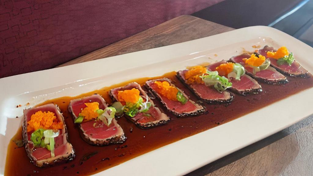 Pepper Tuna Tataki · Fish that has been seared and is raw in the middle.
