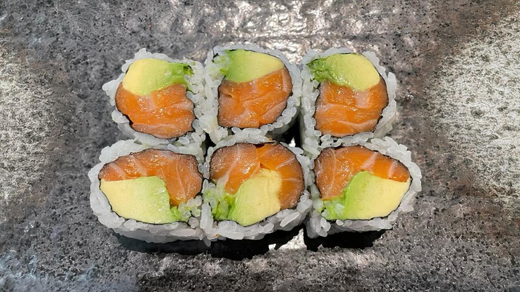 Salmon Avocado Roll · Sushi roll prepared with salmon and avocado.