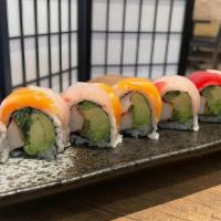 Rainbow Roll · Crab meat, cucumber, avocado inside. Topped with tuna, salmon, yellowtail and white fish.