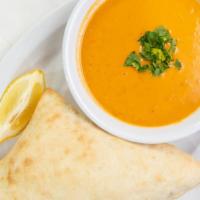 Lentil Soup · Served with a side of pita bread.