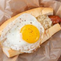 Breakfast Sandwich · Choice of sausage in a bun with sunny side up egg.