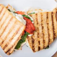 Tuscan · Fresh mozzarella, fresh basil, spinach, roasted red pepper and sundried tomato spread.