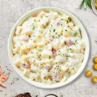 Potato Salad · Diced potatoes dressed in mayonnaise and yellow mustard, and mixed with celery seed, hard-bo...