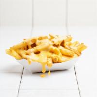 Cheesy Fries · Housemade Cheese Sauce on French Fries..