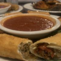 Meat Rolls · minced pepperoni, meatballs, sausage and mozzarella cheese. seasoned and wrapped in an fried...