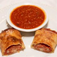Pepperoni Roll · thinly stretched pizza dough filled with pepperoni and. mozzarella cheese.