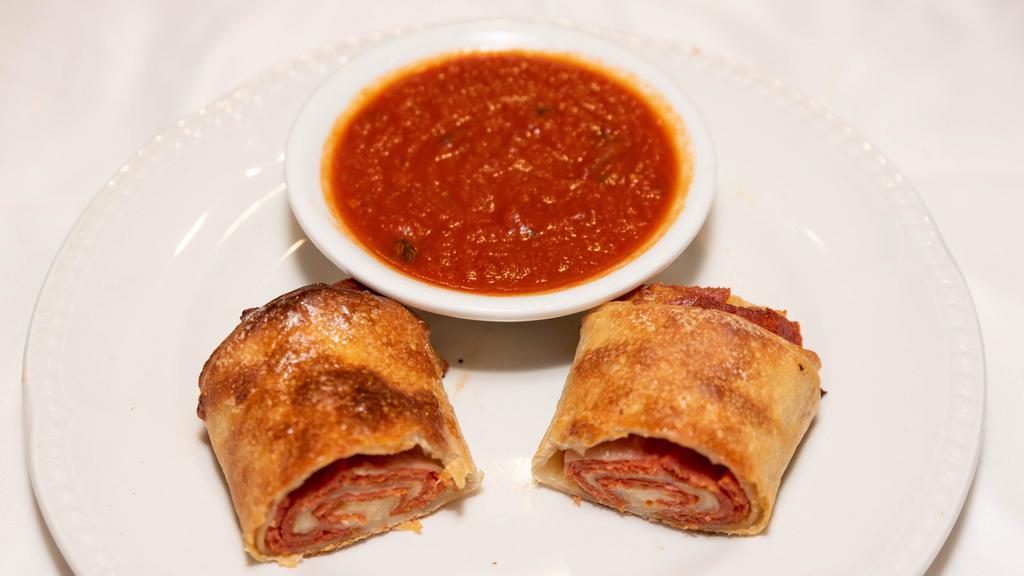 Pepperoni Roll · thinly stretched pizza dough filled with pepperoni and. mozzarella cheese.