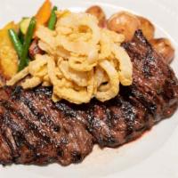 Skirt Steak · Grilled 12oz skirt steak, topped with crispy fried onions. served with roasted potatoes & a ...