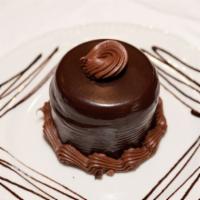 Death By Chocolate · An individual sized chocolate cake with each layer slathered. wtih chocolate butter cream co...