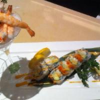 Sushi Lunch · 5 piece sushi and California roll. Served with miso soup or ginger salad.