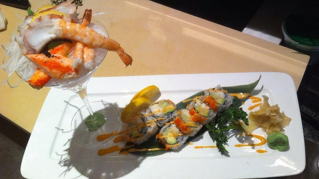 Sushi Lunch · 5 piece sushi and California roll. Served with miso soup or ginger salad.
