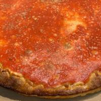 Upsidedown Chicago Pizza · Mozzarella on the bottom pizza sauce on the top deep dish crust cooked any special black pan...