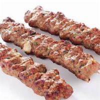 Kofta Kebab · Ground seasoned beef, grilled over fire.