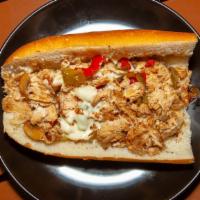 Chicken Cheesesteak Submarine Sandwich · With onions, peppers, mushrooms, and sauce.
