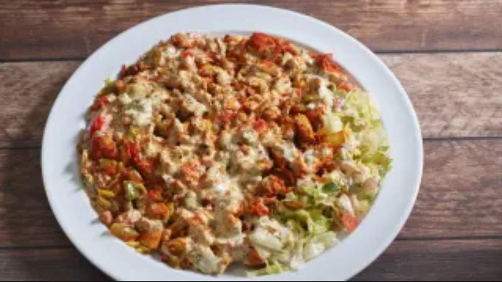 Chicken Gyro Platter · Served over rice with salad, white and hot sauce.