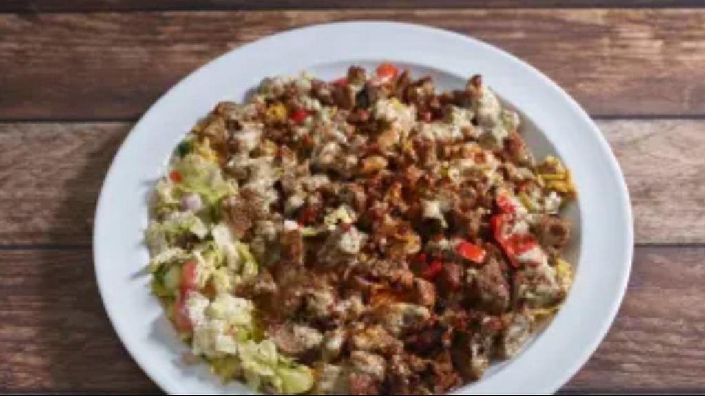 Lamb Gyro Platter · Most popular. Served over rice with salad, white and hot sauce.