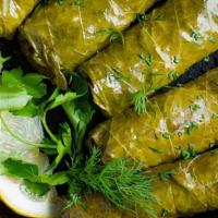 Stuffed Grape Leaves · Stuffed with a tantalizing mixture of rice, fresh dill, mint and lemon.