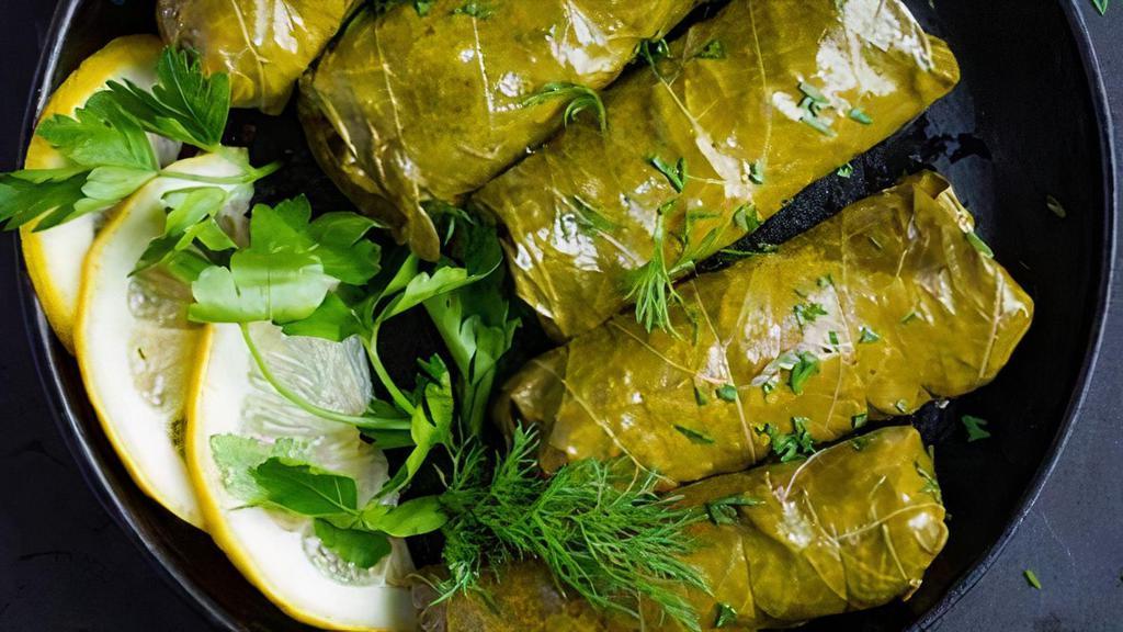 Stuffed Grape Leaves · Stuffed with a tantalizing mixture of rice, fresh dill, mint and lemon.