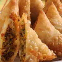 Chicken Samosa · 2 pieces. Seasoned ground chicken wrapped in a light pastry.