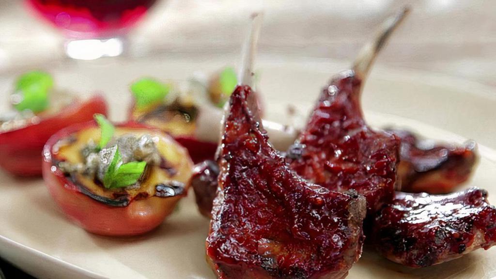 Baby Lamb Chops · 2 tender baby lamb chops marinated in a blend of spices and yogurt and grilled in the tandoor.